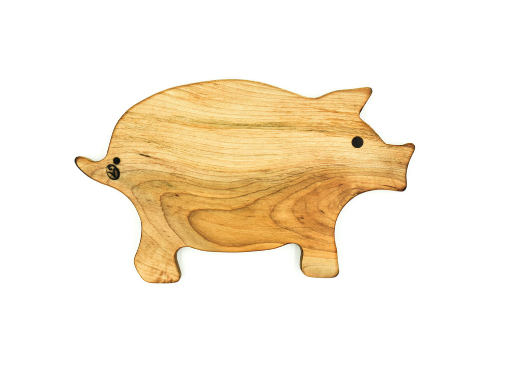 Hand crafted pig-shaped cutting board
